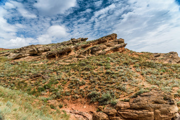 View of the quaint sandstone formations on the mountain Big Bogdo.
