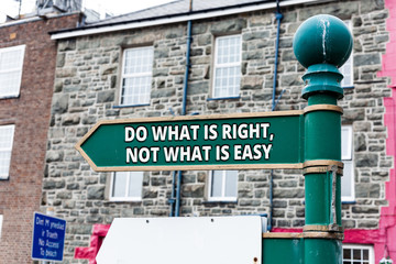 Writing note showing Do What Is Right Not What Is Easy. Business concept for willing to stand up...