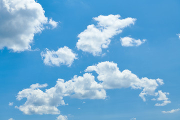 Bright beautiful blue sky with clouds for background or texture