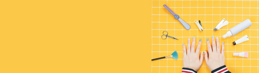 healthier woman and beauty treatment activity with flatlay and minimal style from hand and fingernail put on yellow background with hand spa equipment