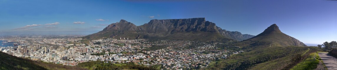 Fototapeta na wymiar Panoramic view of Cape Town, South Africa, with Table Mountain and Lion's Head in sunny day