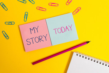 Handwriting text My Story. Conceptual photo the things or situations that have happened to someone in life Colored square blank sticky spiral notepads pencil clips color background