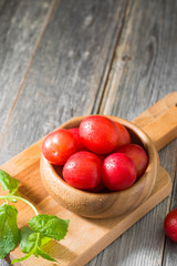 Red plum. Healthy diet. Light grey background