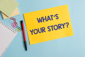 Writing note showing What S Is Your Story question. Business concept for analysisner of asking demonstrating about past life events Plain cardboard and writing equipment placed on pastel colour