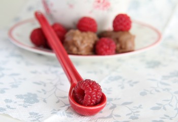 raspberries in a spoon 