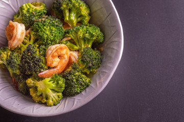 Close up homemade  Fried broccoli with shrimp. (selective focus)