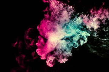 Colored background with winding clouds of smoke from patterns of different forms of pink, green and blue colors with tongues of flame on a black isolated background