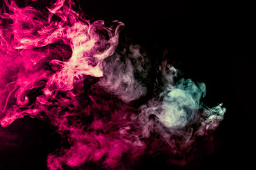 Colored background with winding clouds of smoke from patterns of different forms of pink, green and blue colors with tongues of flame on a black isolated background