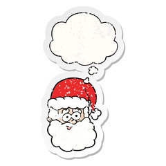 cartoon santa claus and thought bubble as a distressed worn sticker