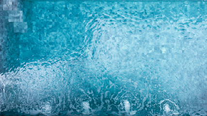 Swimming pool with water flow, Copy space, summer vacation concept.