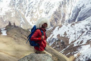 Hiker with traditional papakha fur hat at Mtskheta-Mtianeti region in Georgia