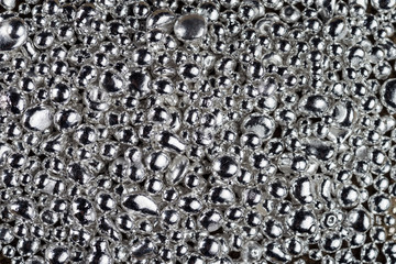 Pure silver granule texture. Background from silver pellets.