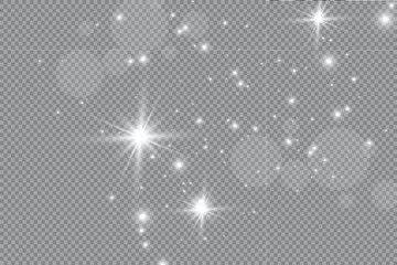 The dust is yellow. yellow sparks and golden stars shine with special light. Vector sparkles on a transparent background. Christmas light effect. Sparkling magical dust particles.