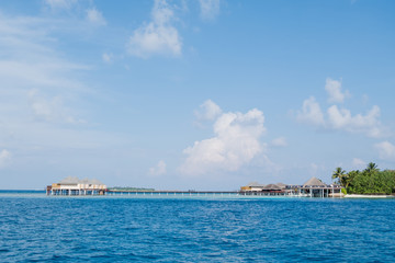 Fototapeta na wymiar Calm Sea and Blue Sky Background in Maldives