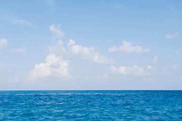 Naklejka na ściany i meble Calm Sea and Blue Sky Background in Maldives