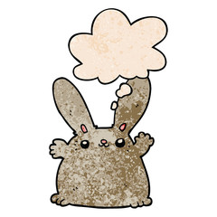 cartoon rabbit and thought bubble in grunge texture pattern style