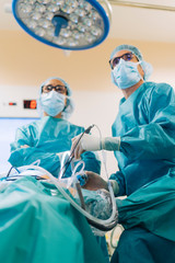 Team of surgeons operating in the hospital