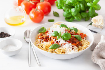 spaghetti bolognese with basil and parmesan, italian pasta