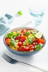 healthy vegan avocado sweetcorn tomato salad