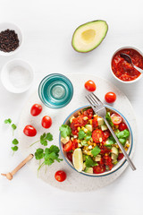 healthy vegan avocado sweetcorn tomato salad