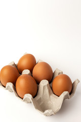 Fresh raw eggs on white background