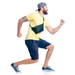 Man in shorts and cap walking goes running happiness smiling on white background isolation