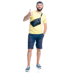 Man in shorts and cap standing happiness smiling on white background isolation