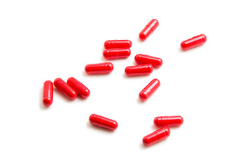 Red pill isolated on white