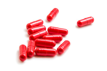 Red pill isolated on white