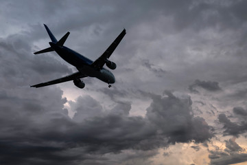 Airplane over the clouds