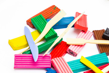 Multi-colored plasticine isolated on white