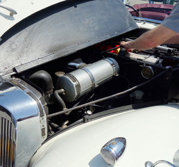Interior of an old car engine compartment