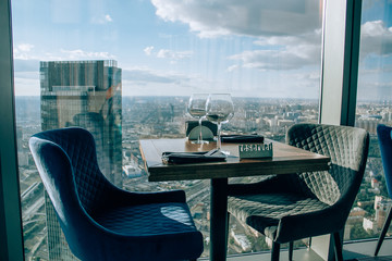 Booked a table in the restaurant Moscow city on 89 floors. Served with two glasses and Cutlery.