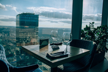 Booked a table in the restaurant Moscow city on 89 floors. Served with two glasses and Cutlery.