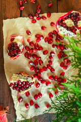 pomegranate fruit red and branches green  (vitamin dessert) festive atmosphere. top food background. copy space