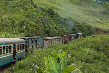 Old diesel train in the tropical countryside of east Madagascar between Fianarantsoa  and Manakara.
