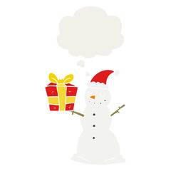 cartoon snowman with present and thought bubble in retro style