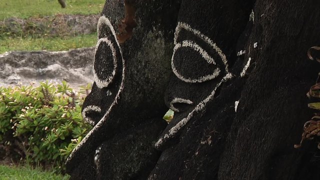 MEDIUM CLOSE UP side view of Traditional tam tam wooden carving in Vanuatu