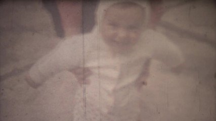 Family chronicle: Mother teach their child to walk. 8mm retro camera.