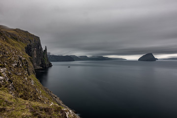 Long exposure of Trollkonufingur, Witch's Finger edge in Faroe Islands