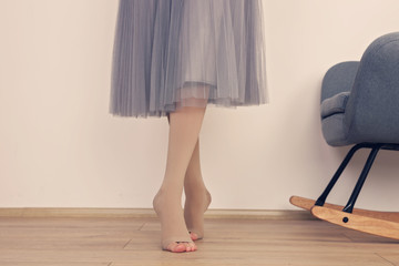 Varicose veins prevention, Compression tights, relief for tired legs. Beautiful long female legs in stockings