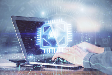 A man working on Laptop with technology theme drawing. Concept of big data. Double exposure.