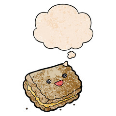 cartoon biscuit and thought bubble in grunge texture pattern style