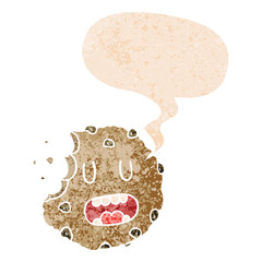 cartoon cookie and speech bubble in retro textured style