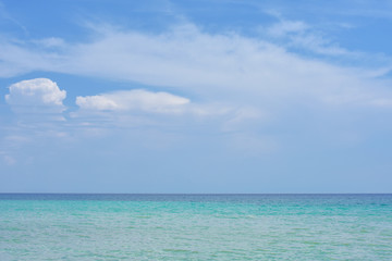 Fototapeta na wymiar Beautiful tropical sea under the blue sky.