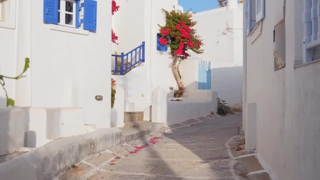Walking in Naousa street on Paros island, Greece