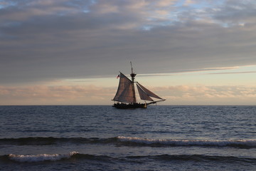 Fototapeta na wymiar Tall ship on the lake