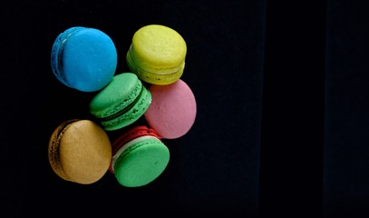 Macarons on green background