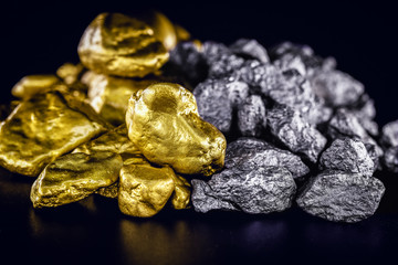 stones of gold and silver gross, mineral extraction of gold and silver. Concept of luxury and...