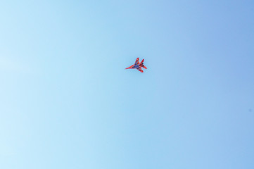 plane in the blue sky